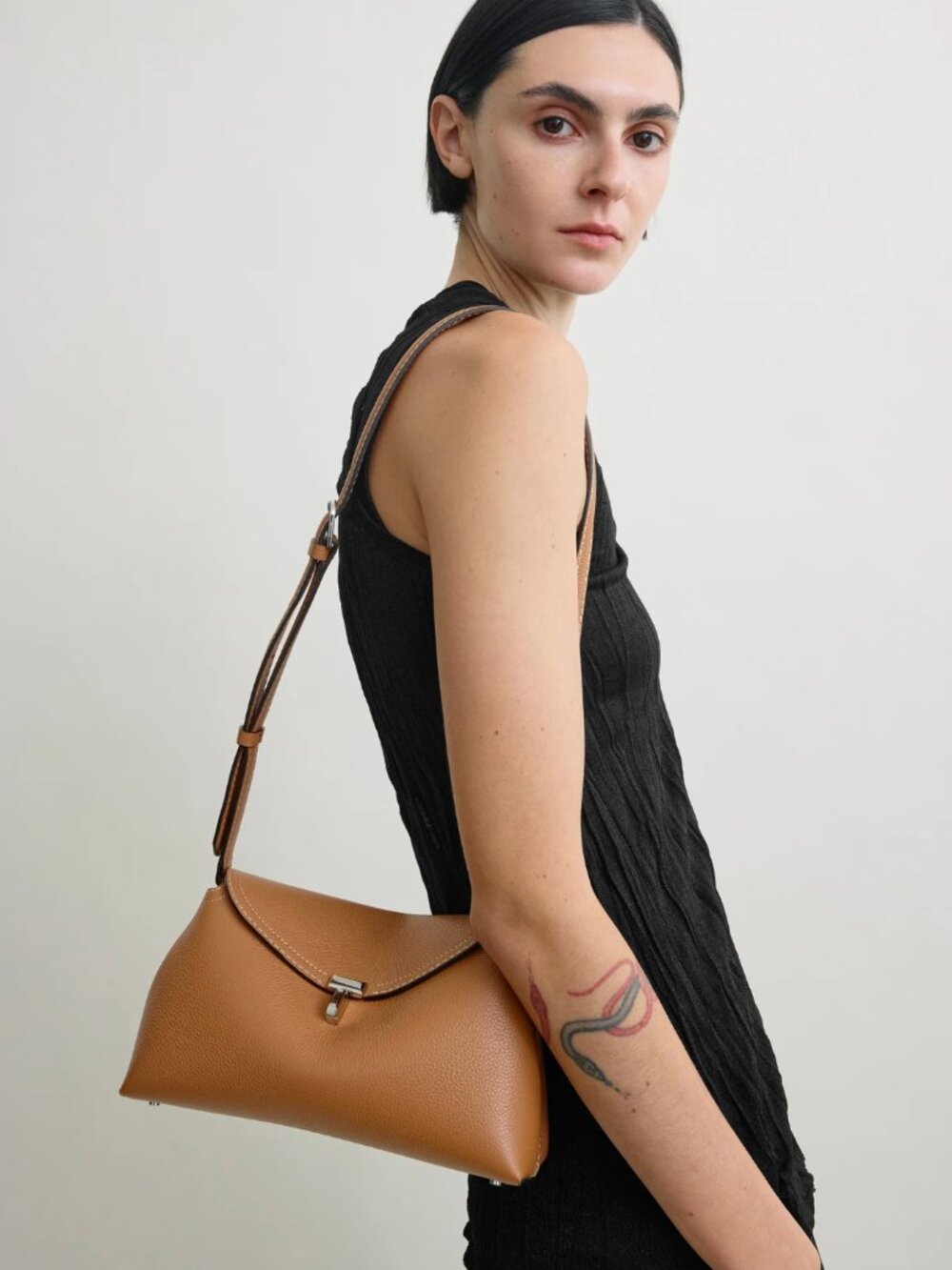 Toteme T-Lock Convertible Grain Leather Clutch or Crossbody